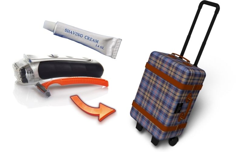 Photo of electric razor, disposable razor, a tube of shaving cream and a luggage