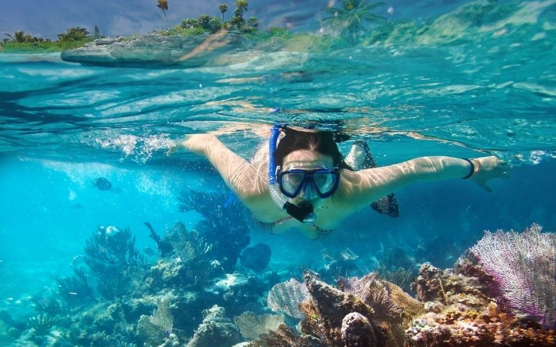 young women snorkeling