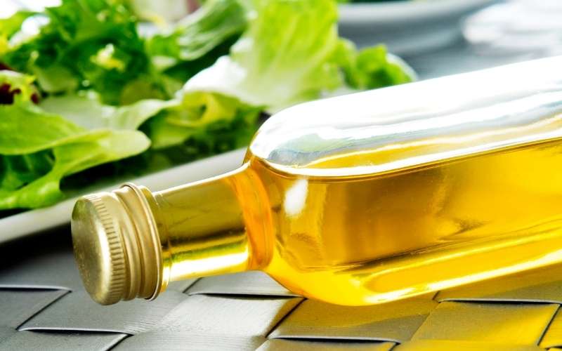 bottle of spanish olive oil on a set table