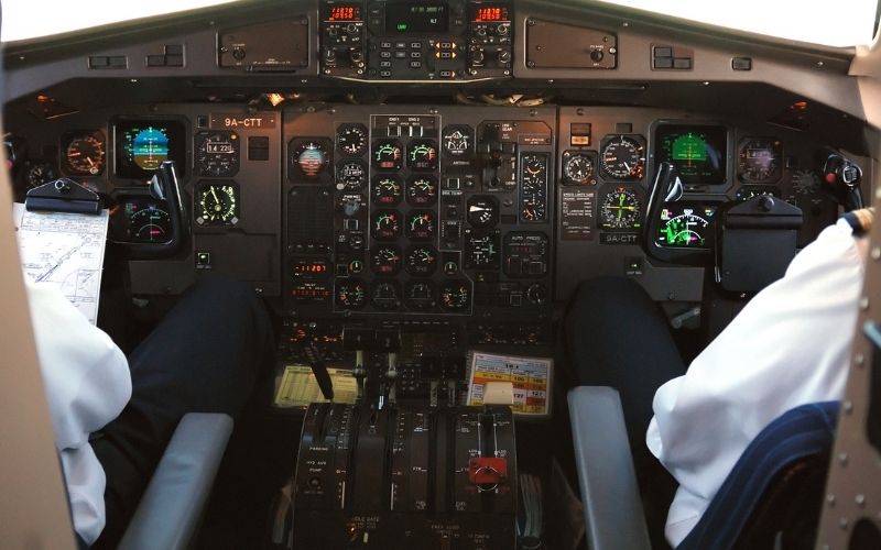 Photo of a cockpit area of an airplane