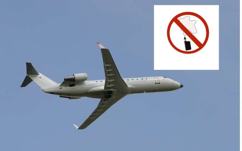 white plane on blue background and vape ban graphics